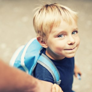 Kid backpack going to school